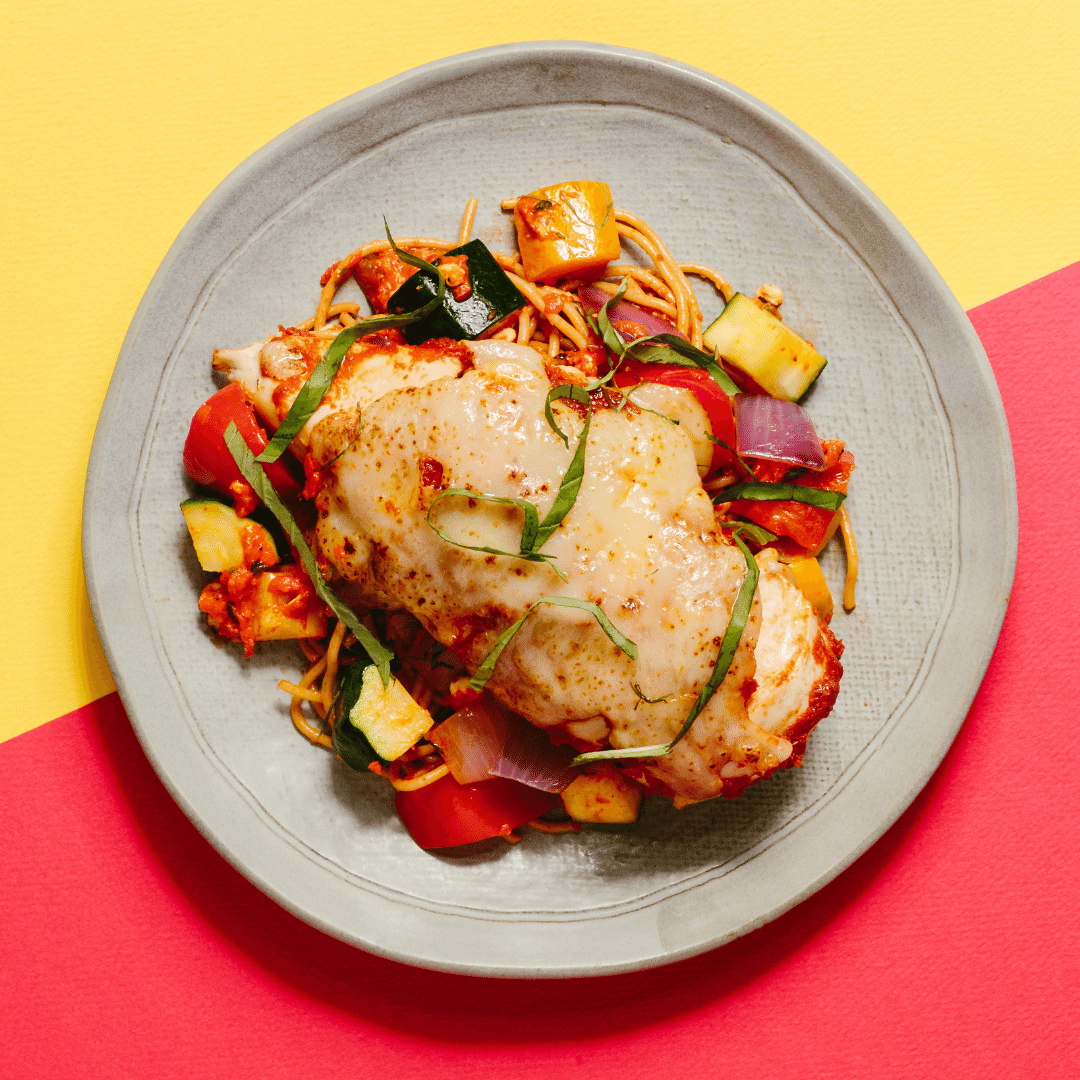 Breadless Chicken Parmesan with Roasted Red Pepper Pesto Vegetables