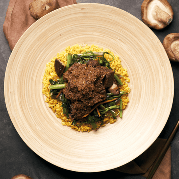 Padang Beef Rendang with Morning Glory, Brown Mushrooms & Shredded Carrots