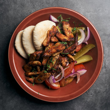 Chicken Shawarma with Roasted Vegetables, Hummus and Mini Pita Bread