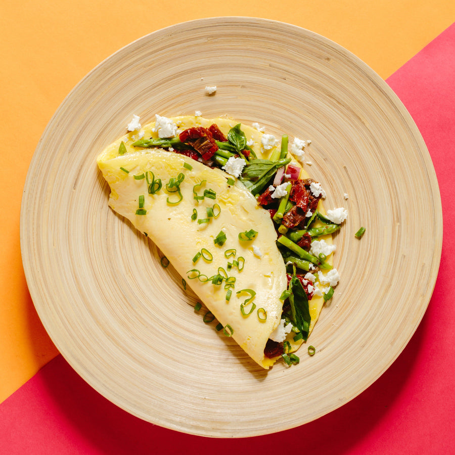 Asparagus & Sundried Tomato Omelette with Red Onion, Basil Pistou & Chevre