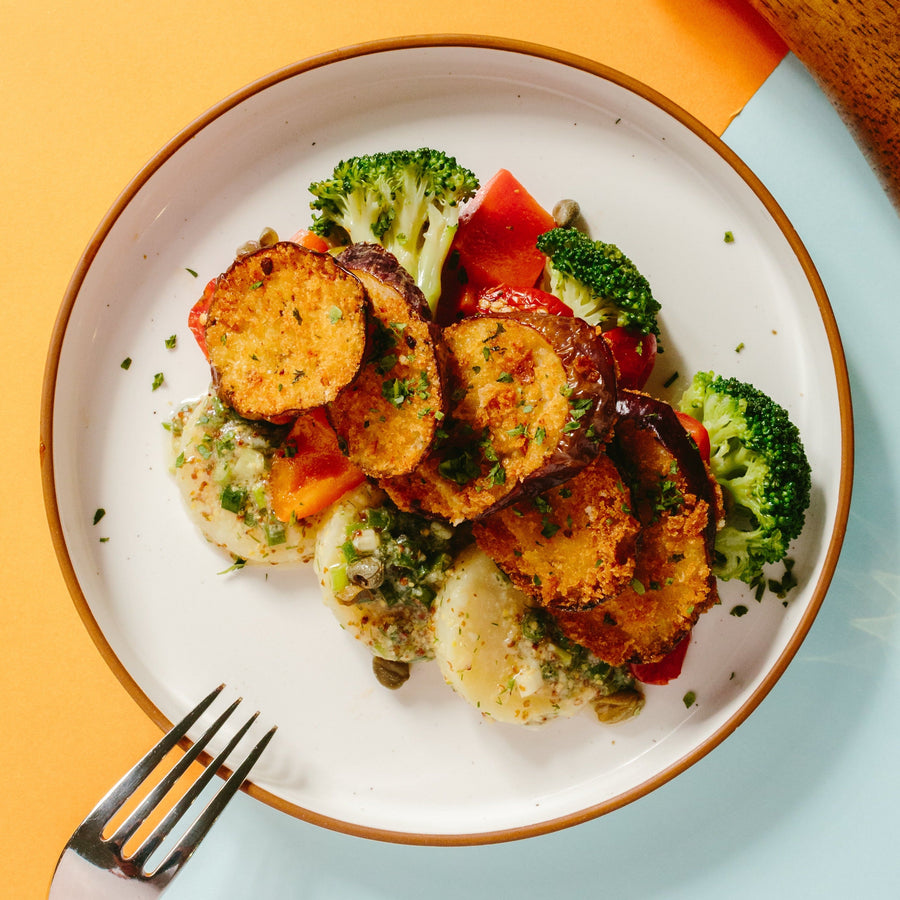 Eggplant Schnitzel with Lemon Dill Potato Salad, Roasted Red Peppers & Broccoli