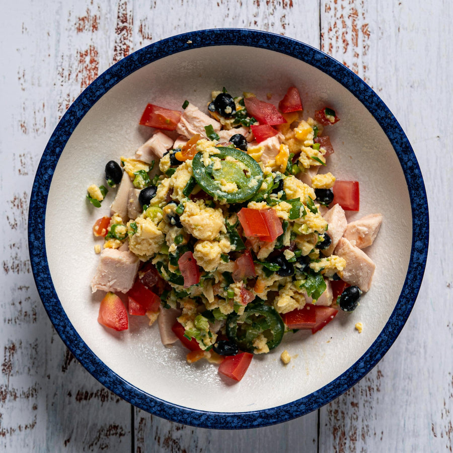 Smoked Chicken Breast Mediterranean Scrambled Egg with Zucchini, Roasted Red Peppers, Sundried Tomato, Feta Cheese & Oregano