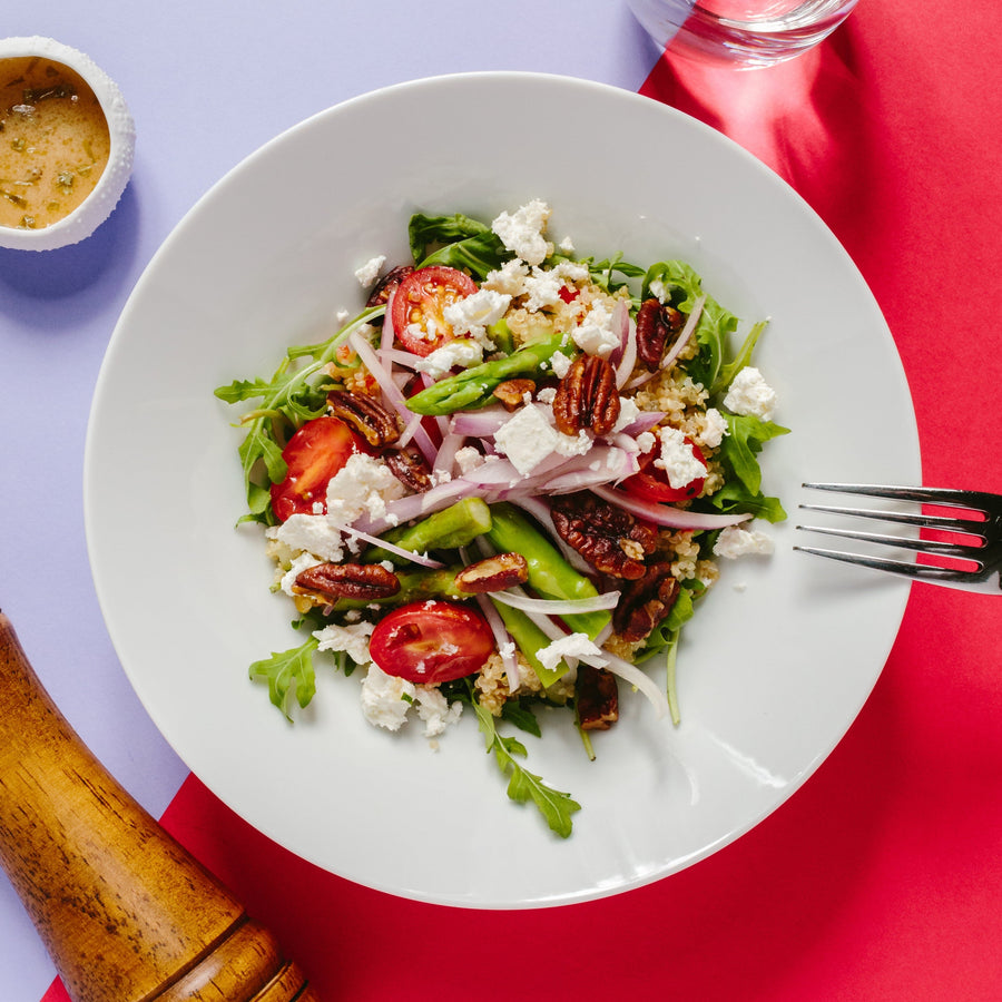 Warm Quinoa Salad with Wilted Greens, Tomato, Asparagus, Lemon & Tarragon Vinaigrette, Candied Pecan & Chevre