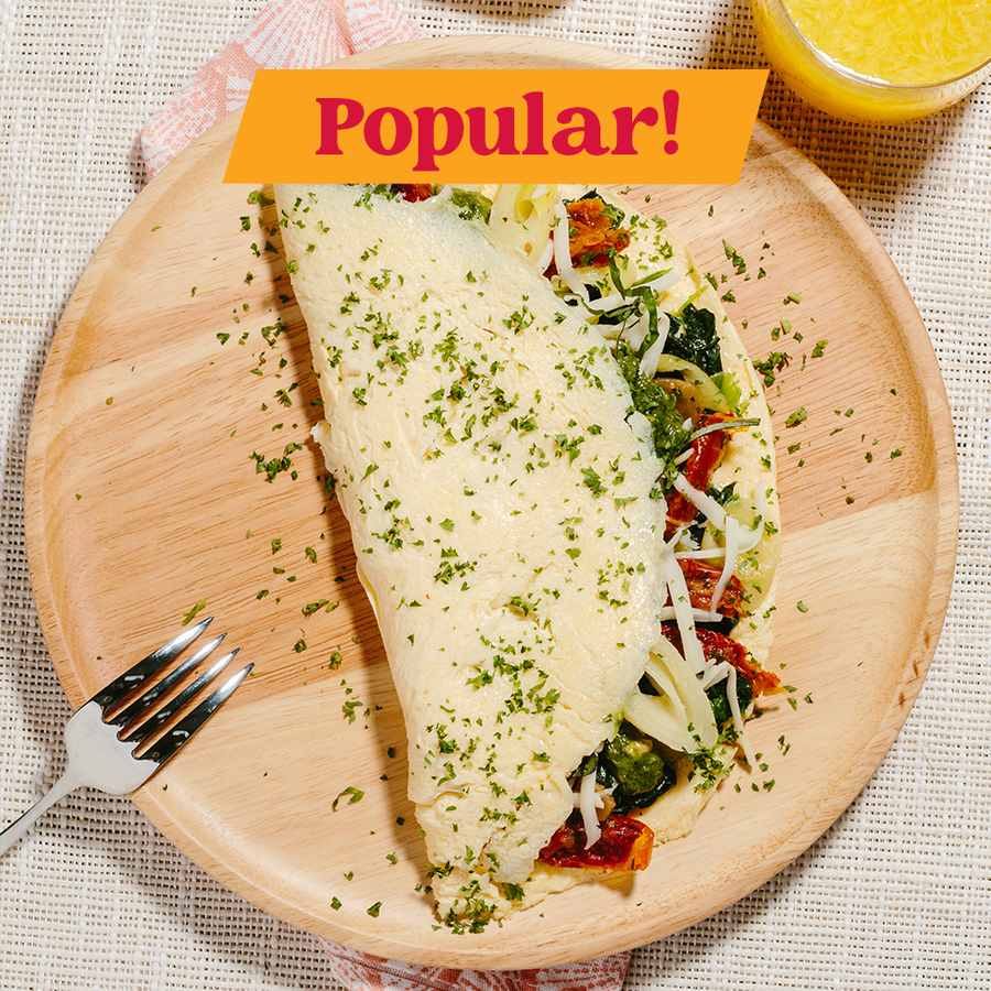 Pesto & Braised Leek Omelette with Sundried Tomatoes, Spinach, Basil & Provolone