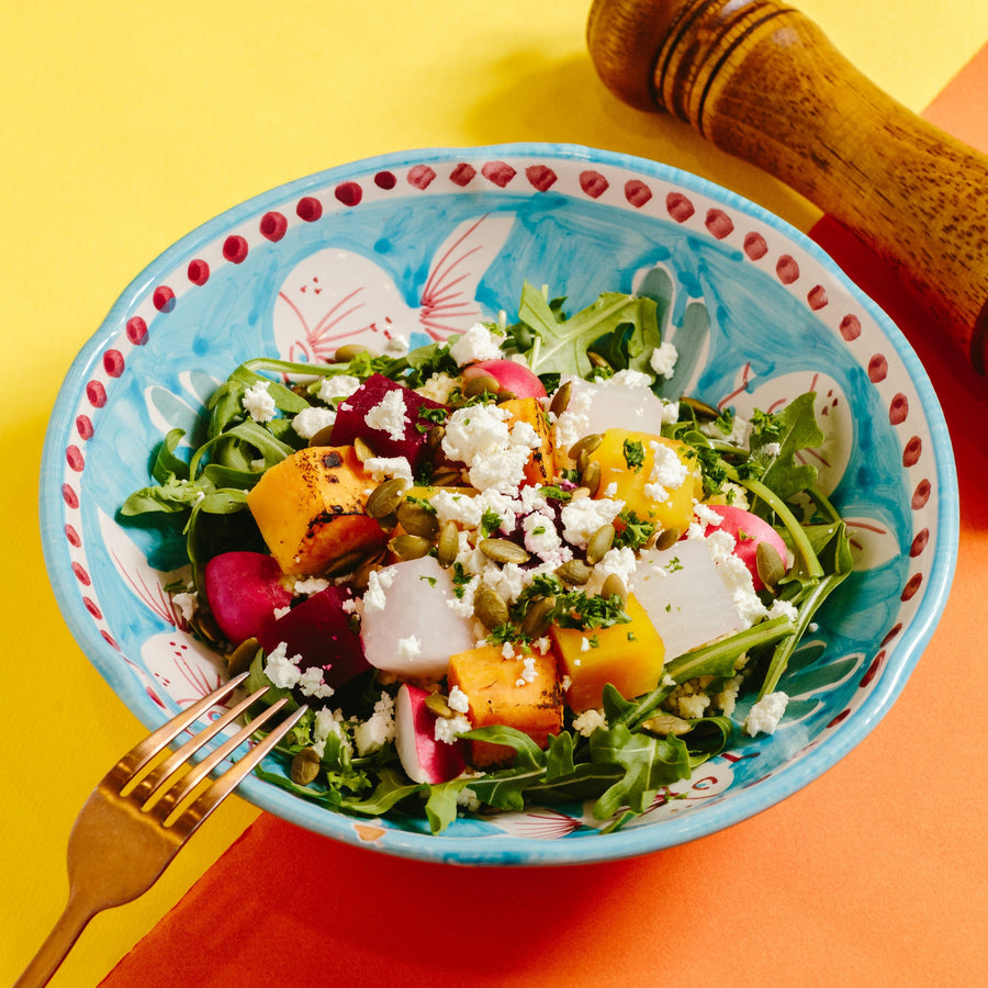 Root Vegetable Salad with Goat Cheese, Black Garlic Vinaigrette, Pepitas & Cous Cous