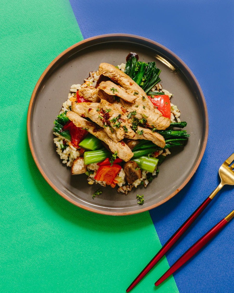 Sweet Soy Glazed Positively Plant Based Meet Strips with Eggplant, Choy Sum & Vegetable Fried Rice