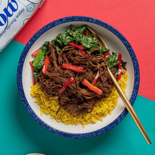Pulled Beef Brisket Rendang with Sautéed Chinese Mustard Greens, Red Chili, Garlic & Lemon (Turmeric Coconut Rice)